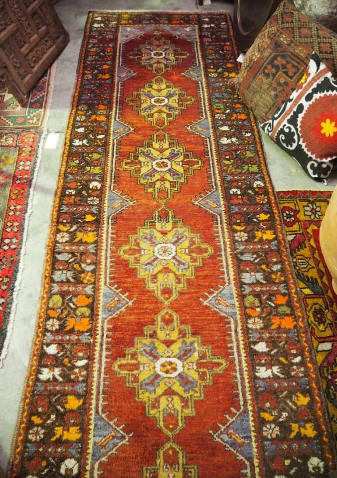 Double knotted Turkish wool runer from Kirsehir using vegetable dyes. Approximately 80 years old
