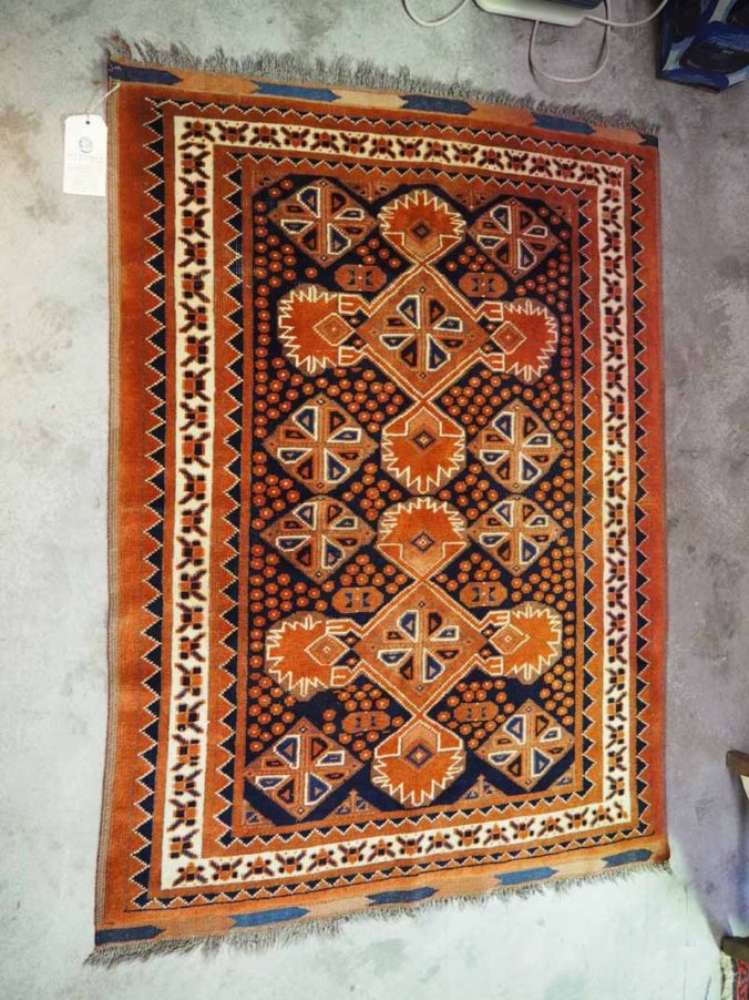 Hand made wool on wool carpet from Afghanistan. Approximately 30 years old