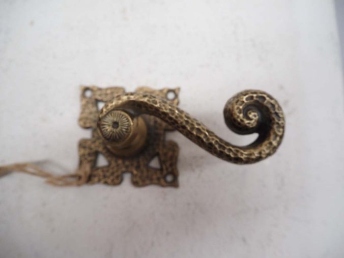 antique metal homeware Cast brass door handle c.1910
