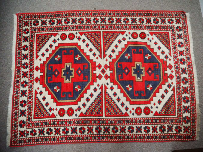Hand knotted wool on wool caucasian carpet, Kazak tribe approximately 70 years old