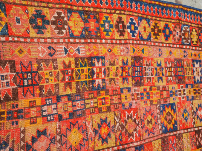 wool on wool hand knotted Kurdish rug, approximately 120 - 150 years old