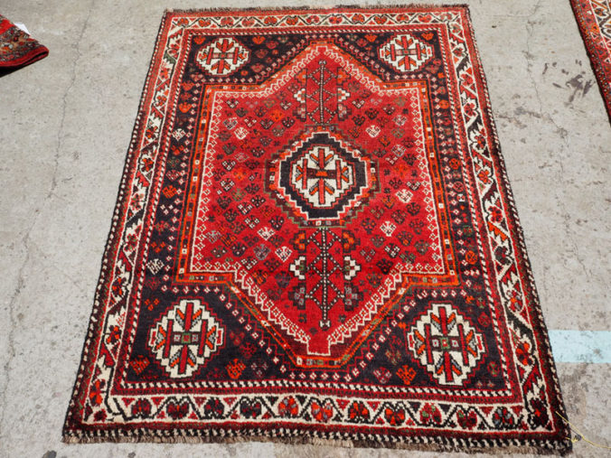 Hand knotted wool on wool Persian carpet from Shiraz, approximately 30 - 40 years old