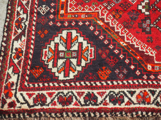 Hand knotted wool on wool Persian carpet from Shiraz, approximately 30 - 40 years old