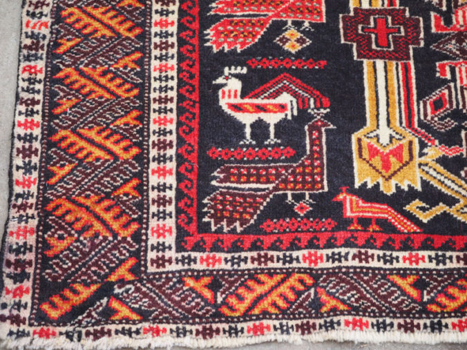 Hand knotted wool on wool Belouch carpet, approximately 50 years old