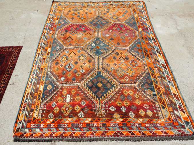 Hand knotted wool on wool Persian carpet from Shiraz, approximately 40 - 50 years old