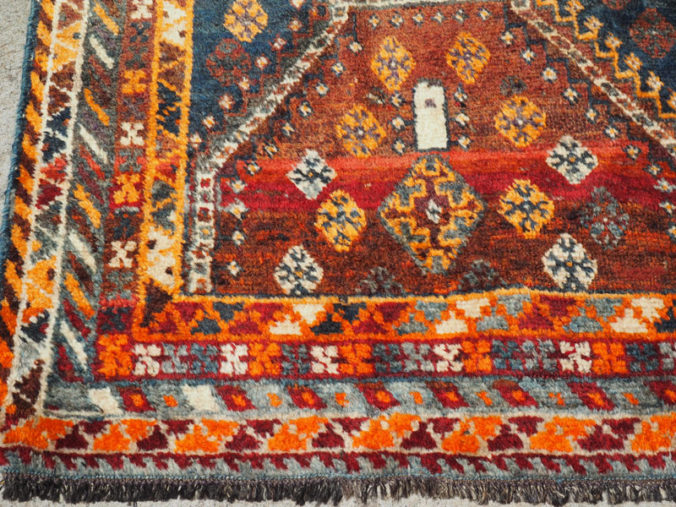 Hand knotted wool on wool Persian carpet from Shiraz, approximately 40 - 50 years old