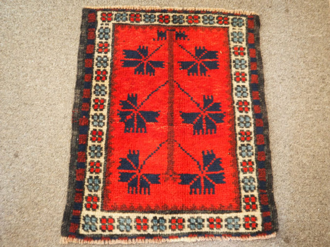 Small hand knotted wool on wool table mat from Bergama, approximately 40 years old